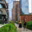 People walk along the High Line, an old rail line that was converted to an elevated park and greenway in Manhattan. Credit: Sergi Reboredo/VW Pics/Universal Images Group via Getty Images