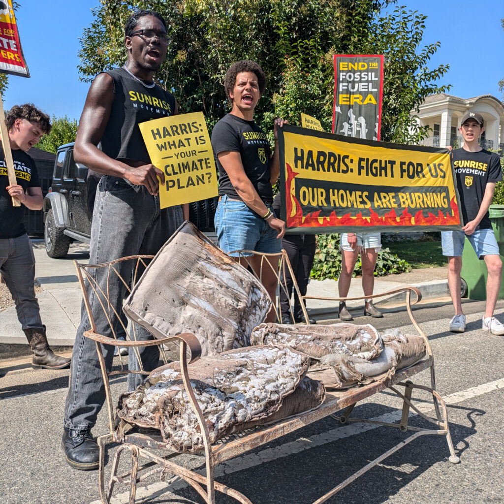 On Monday, young people with the Sunrise Movement went to Kamala Harris’ LA home with a couch burnt by the Airport Fire to ask her for a plan to address climate change and hold oil and gas companies accountable for climate disasters. Credit: Izzy Harrison/Sunrise Movement